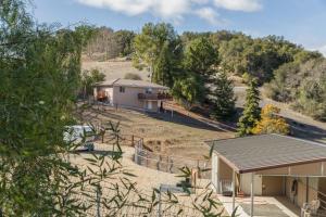 an aerial view of a house with a fence at Serendipity Retreat - Dogs Welcome Farm Tours and Private Yoga Sessions in Atascadero
