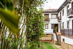 a view of a house from the garden at La Heredad Villa de Leyva in Villa de Leyva