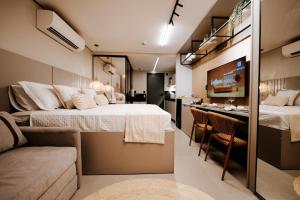 Voodi või voodid majutusasutuse Flat pé na areia no Bessa, acomoda até 5 hóspedes toas