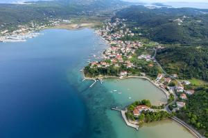 an aerial view of a small island in the water at Rooms by the sea Supetarska Draga - Donja, Rab - 23068 in Rab