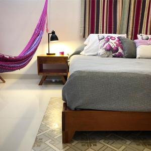 Postel nebo postele na pokoji v ubytování Villa Nelly + 3 fotografie