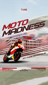 a man riding a motorcycle on a race track at Tune Hotel KLIA Aeropolis (Airport Hotel) in Sepang