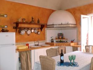 A kitchen or kitchenette at Favignana Margot House