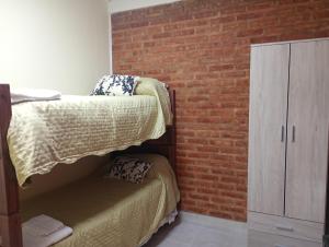 Un ou plusieurs lits dans un hébergement de l'établissement Departamento Saturnino