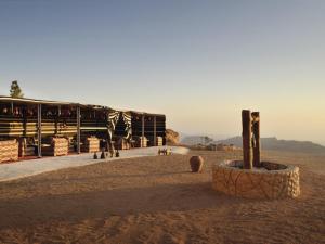 a building in the middle of a desert at Grand Mercure Petra in Wadi Musa