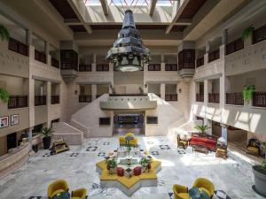an overhead view of a lobby with a large room at Grand Mercure Petra in Wadi Musa