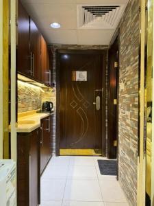 Nhà bếp/bếp nhỏ tại فندق لؤلؤة العنود مكة توصيل مجاني للحرم - Loulouat Al Anood Hotel Makkah Free Shuttle Service