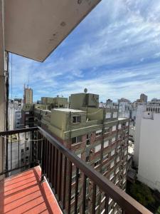 a balcony with a view of a city at Luminoso departamento a tres cuadras del mar in Mar del Plata