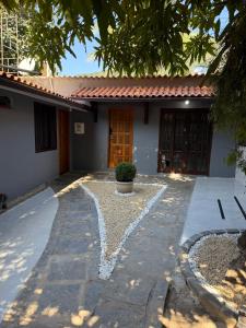 a house with a heart painted on the side of it at Brisamar Suítes Ilha Grande in Angra dos Reis +29 photos
