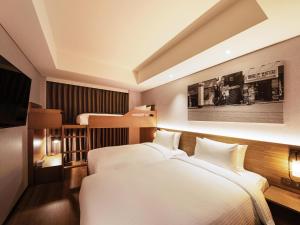 Giường trong phòng chung tại Mercure Ambassador Seoul Hongdae +104 ảnh