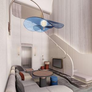 a living room with a couch and a tv at The Reserve Hotel Luoyang, Curio Collection By Hilton in Luoyang