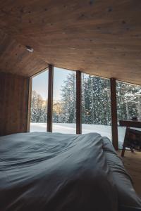 Postel nebo postele na pokoji v ubytování Earthboat Hakuba