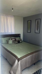 a large bed in a bedroom with a large mattress at Don Bosco Leon in San José de Malpaso +1 photo
