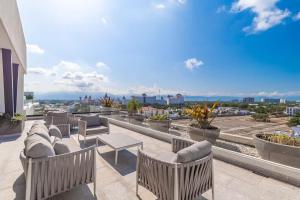 Μπαλκόνι ή βεράντα στο Cómodo condominio a pasos de Vidanta World