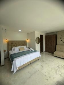 En eller flere senge i et værelse på Faro 201, 202, 203 Lujo en Laureles Ubicación Premium