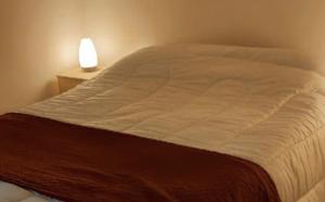 Postel nebo postele na pokoji v ubytování dpto GAMA a cuadras del corsodromo