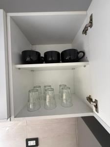 Kuchyň nebo kuchyňský kout v ubytování dpto GAMA a cuadras del corsodromo