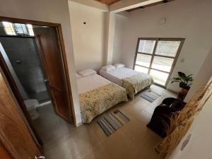 Katil atau katil-katil dalam bilik di Isla Rosa Coveñas - Alojamiento +3 gambar