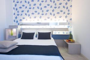 Postel nebo postele na pokoji v ubytování Hotel Torremaura