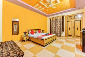 Voodi või voodid majutusasutuse Hotel O Utsav Vatika toas +20 fotot