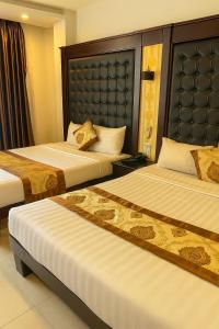 Katil atau katil-katil dalam bilik di Hồng Anh 2 Hotel