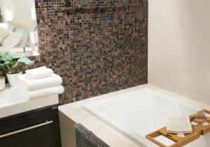a bathroom with a white tub and a tile wall at Beach Penthouse - 3 BR, Jacuzzi, Marriott pool access in Ban Ko Kok +16 photos