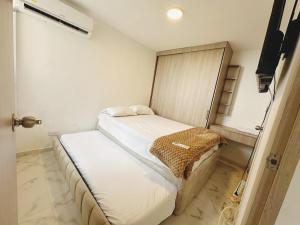 Ένα ή περισσότερα κρεβάτια σε δωμάτιο στο Wow que vista!! Frente Ecoparque 7min CC Buenavista