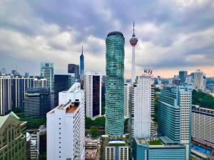 a view of a city with tall buildings at KLCC View Penthouse in Kuala Lumpur