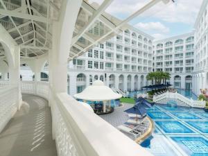 a view of the pool at the resort at Mövenpick Myth Hotel Patong Phuket in Patong Beach