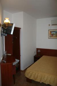 Ένα ή περισσότερα κρεβάτια σε δωμάτιο στο Todorova House