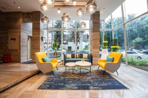 Khu vực ghế ngồi tại Echarm Hotel Fuzhou Sanfang Qixiang East Street Metro Station