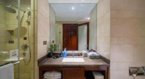 a bathroom with a sink and a shower at Days Hotel by Wyndham Hunan Changsha Convoy in Changsha +72 photos