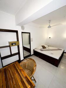 Ένα ή περισσότερα κρεβάτια σε δωμάτιο στο Hotel Surf Resort