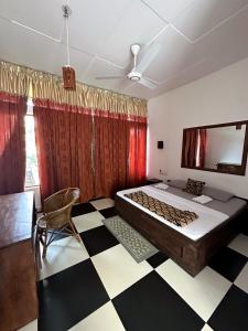 Ένα ή περισσότερα κρεβάτια σε δωμάτιο στο Hotel Surf Resort