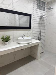 Ένα μπάνιο στο Pleasant apartment +1 φωτογραφίες