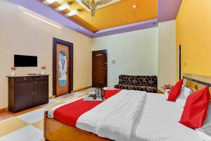 Voodi või voodid majutusasutuse Hotel O Utsav Vatika toas