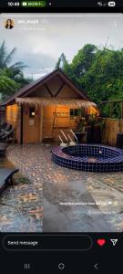 a screenshot of a video of a house at Sauna Patong Bar in Ban Na Nai