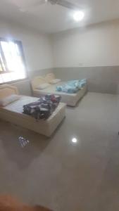 Postel nebo postele na pokoji v ubytování Quriyat