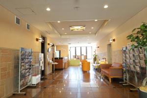 a lobby of a hospital with couches and chairs at Hotel Migrant - Vacation STAY 81252v in Tateyama