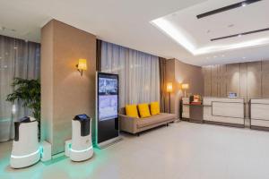 O zonă de relaxare la Home Inn Plus Shanghai New International Expo Center Yushan Road Yuanshen Sports
