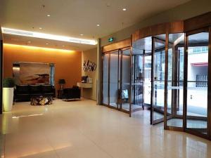 a lobby of a building with glass doors at Jinjiang Inn Xi'an Huimin Street Zhonglou Metro Station in Xi'an