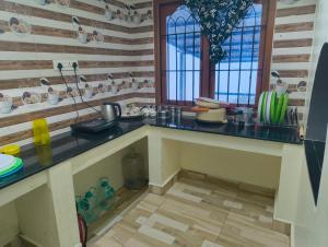 Kuchyň nebo kuchyňský kout v ubytování kurunji view resorts