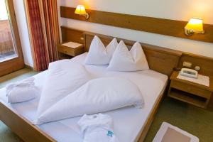 Postel nebo postele na pokoji v ubytování Hotel Waldruhe