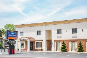 a building with a sign in front of it at Howard Johnson by Wyndham Hershey in Hershey