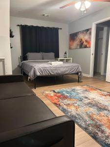 Ένα ή περισσότερα κρεβάτια σε δωμάτιο στο Home In Atlanta