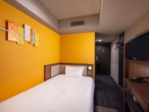 Postel nebo postele na pokoji v ubytování ibis Styles Kyoto Shijo + 110 fotografií