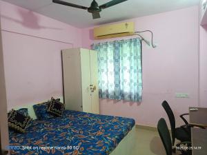 Giường trong phòng chung tại 4 BHk Villa at Ovale, GB Road Thane West