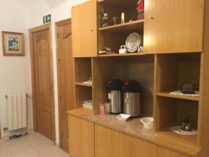Kuchyň nebo kuchyňský kout v ubytování Hostal R. Lido