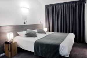 Cama o camas de una habitación en Hotel Mila
