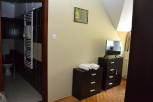 Posteľ alebo postele v izbe v ubytovaní Ezüstfenyő Hotel